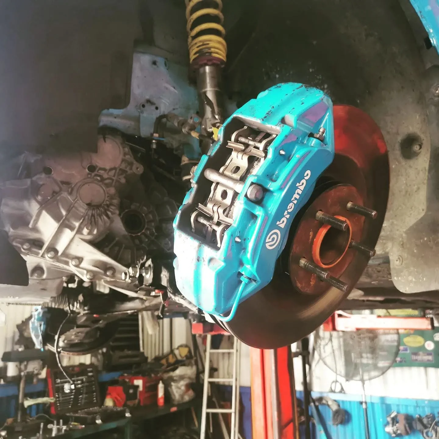 Brembo brake caliper and rotor fitted during a brake and suspension upgrade in Cairns