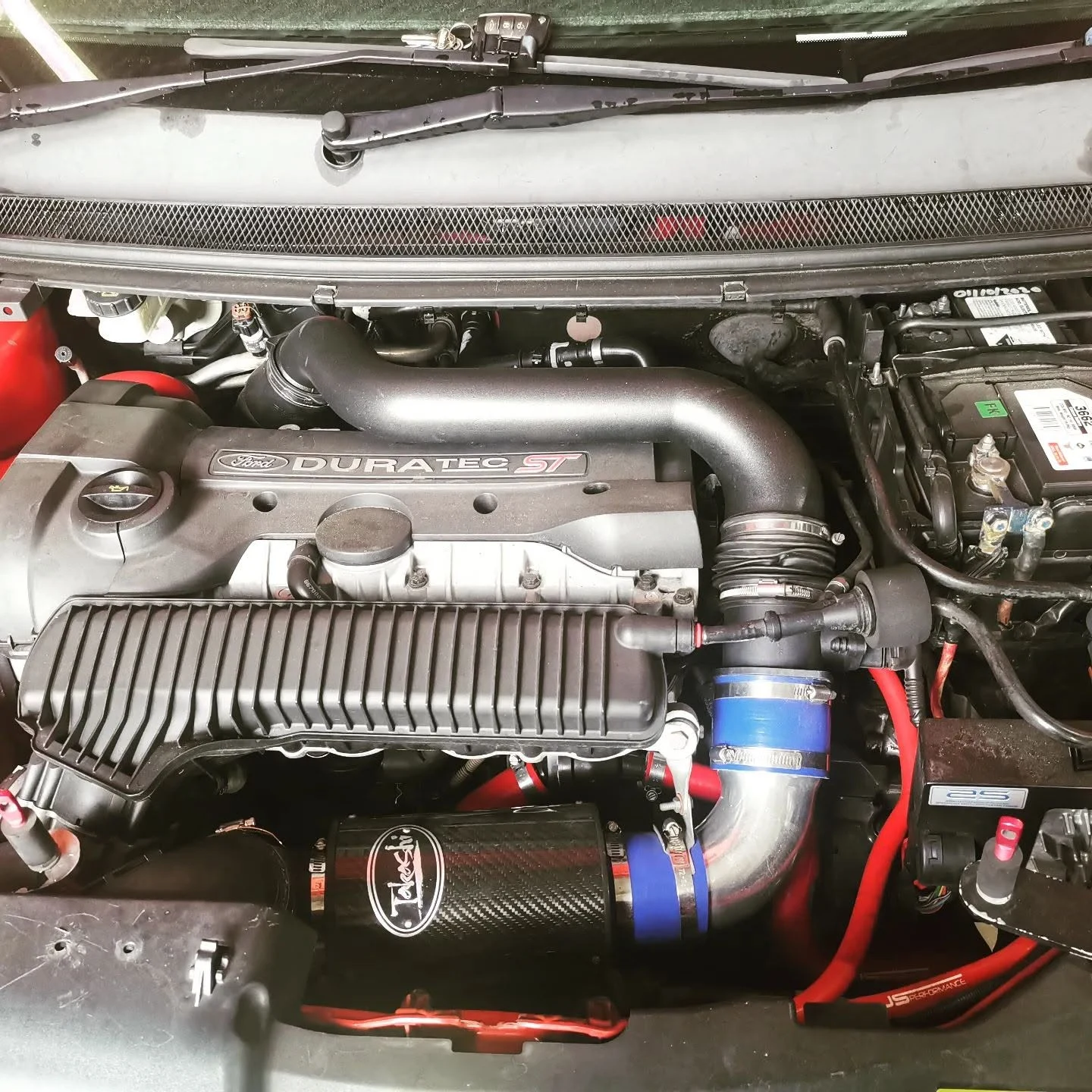 Ford Duratec ST engine bay with carbon intake during diagnostics at S & A Automotive Cairns