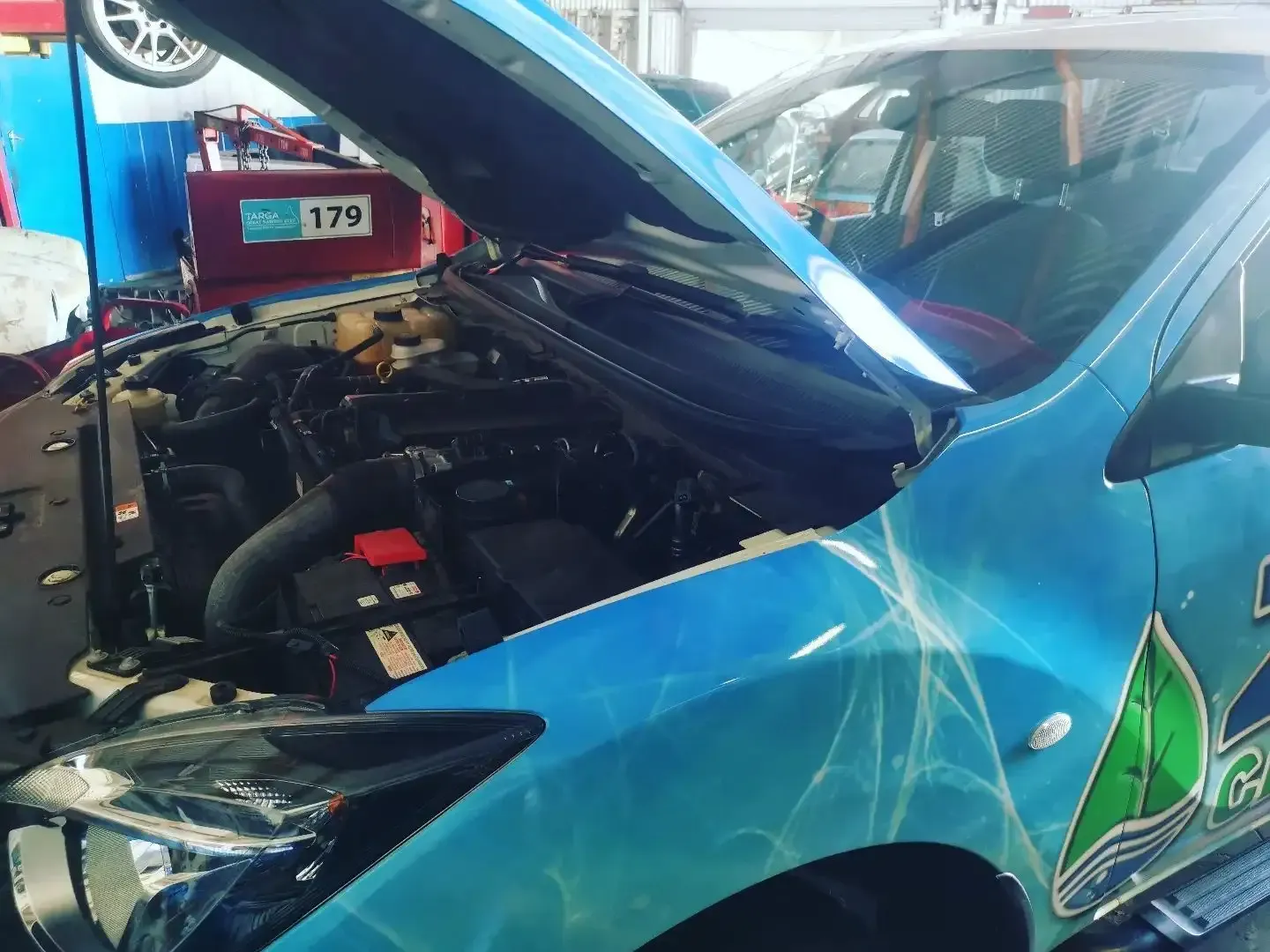 S & A Automotive mechanic running diagnostics on a vehicle in Cairns